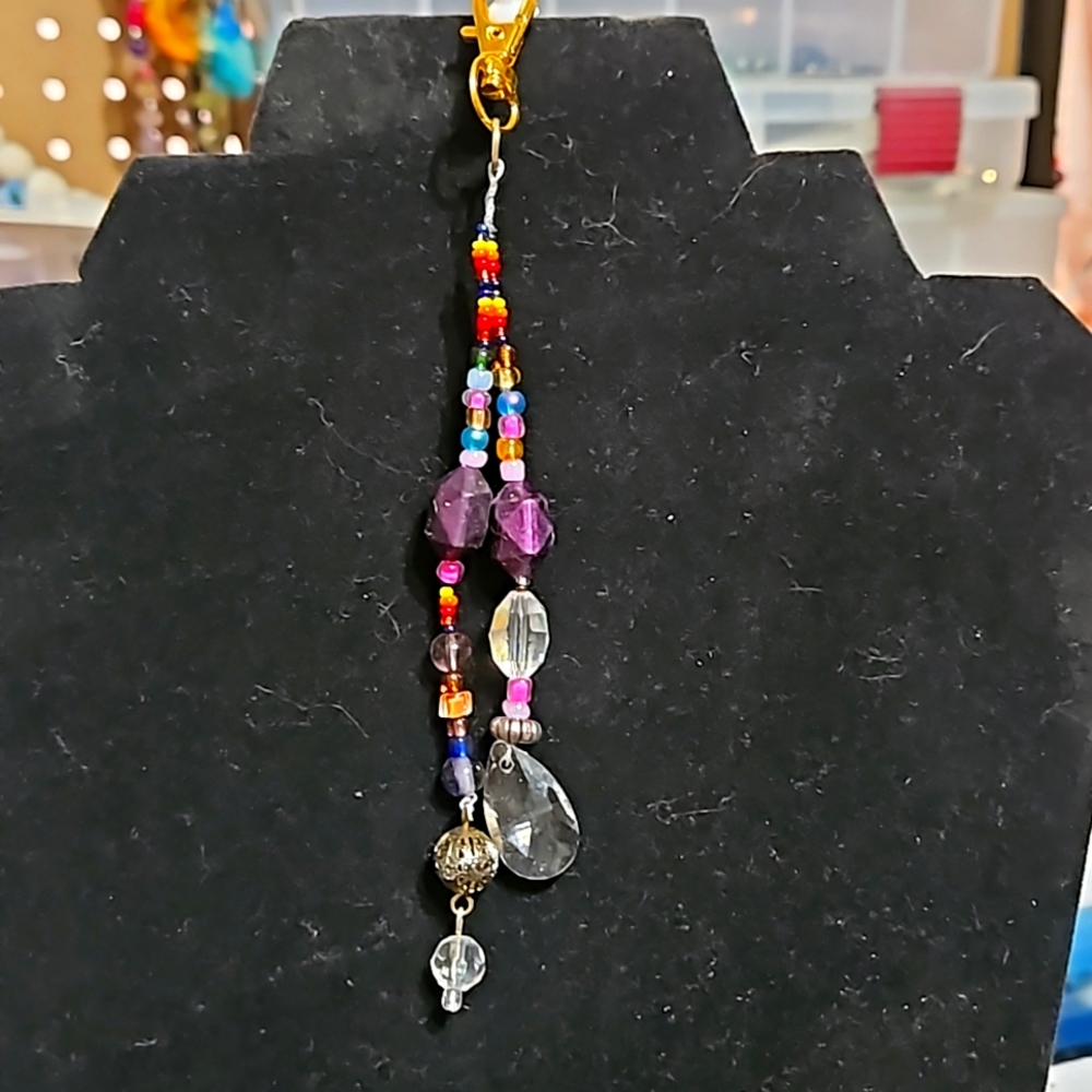 Purse/car charm. multi colored